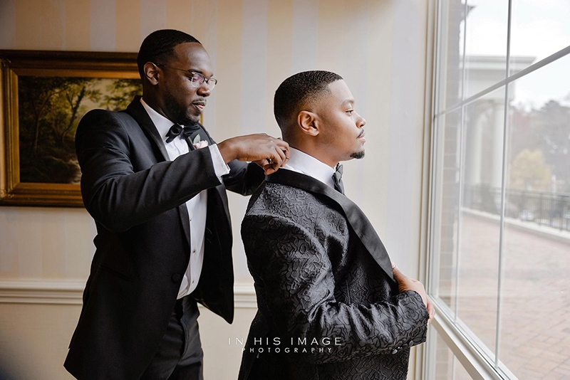 groomsmen getting ready before a wedding