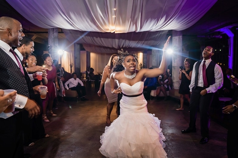 A  bride performing a dance during her wedding reception.