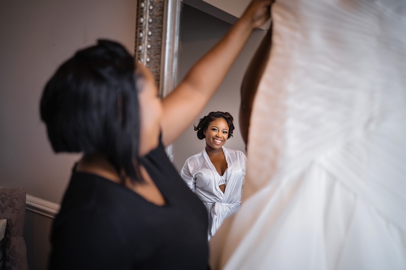 Bride happy about her wedding gown
