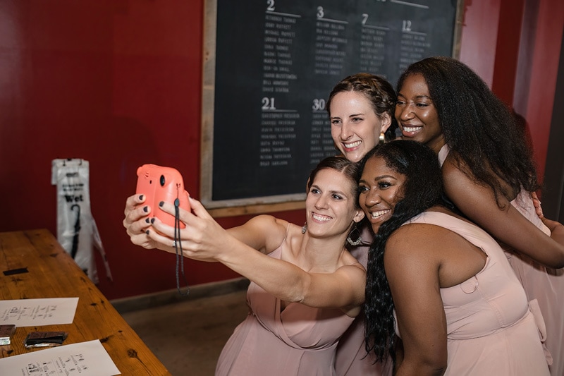 Bridesmaids selfie during wedding reception at The Rickhouse
