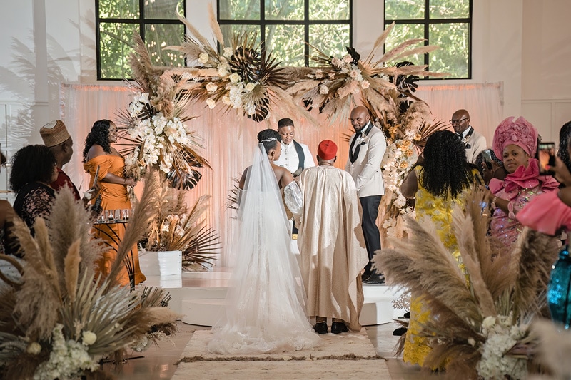 A vibrant African wedding ceremony held at The Distillery, featuring a stunning bride and groom.