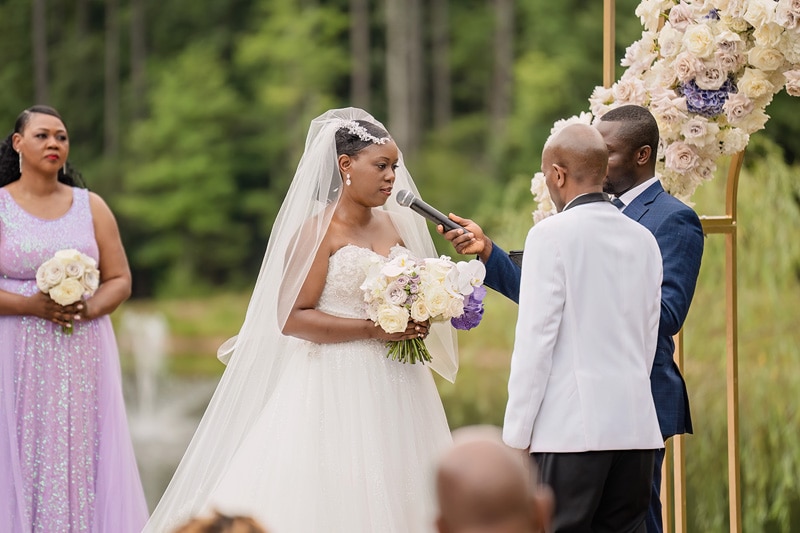 A Pinehill Pavilion wedding ceremony with a bride and groom.