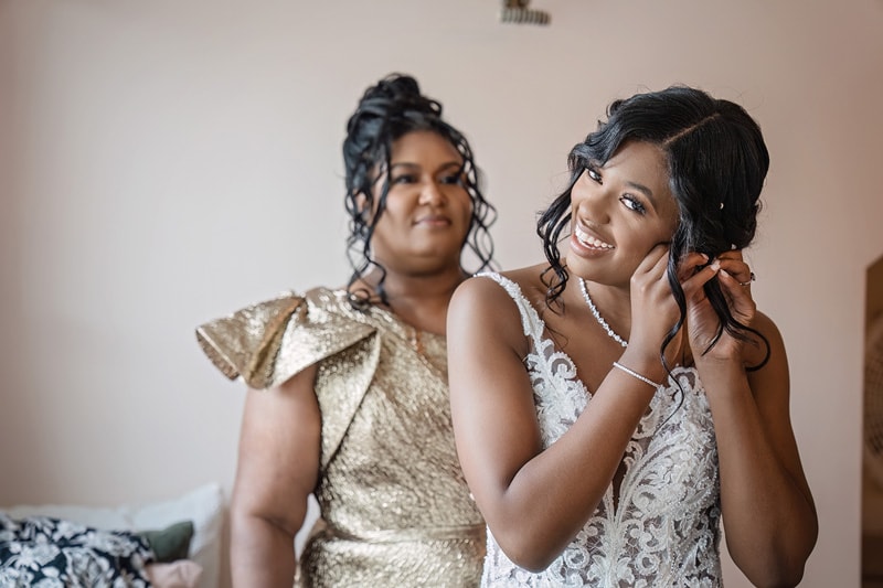 A bride and her mother are getting ready for The Bradford wedding.