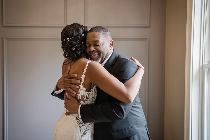 A bride and groom embracing lovingly at The Bradford wedding venue.