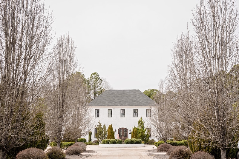 Located at The Bradford Wedding Venue, this white house is nestled among trees and bushes, making it an ideal spot for a beautiful wedding at The Bradford.