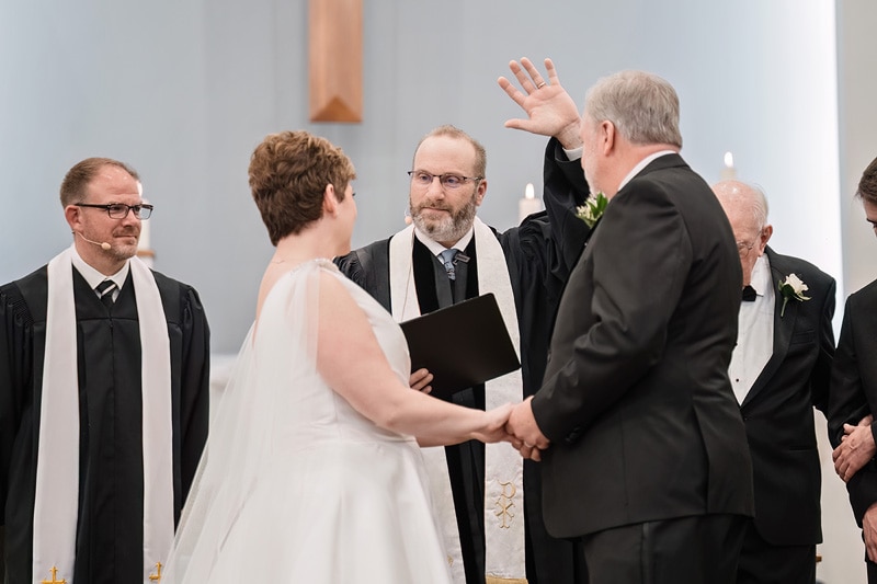 Brad and Shana exchange vows at Westminster Presbyterian Church during their wedding.